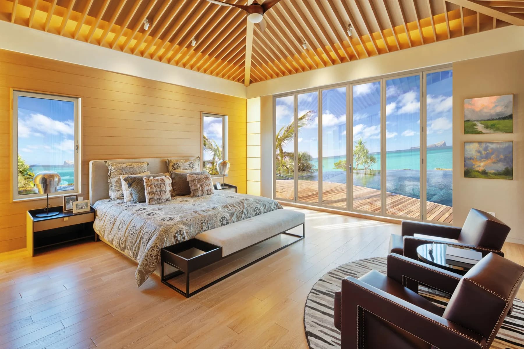 Wood-clad folding doors in a bedroom suite