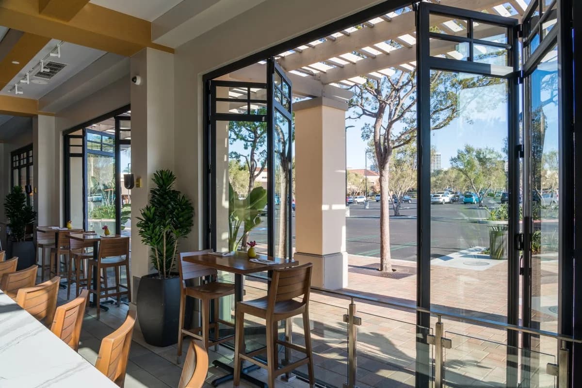 Restaurant folding doors opened to sidewalk seating